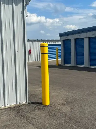 Yellow pop against industrial blues.